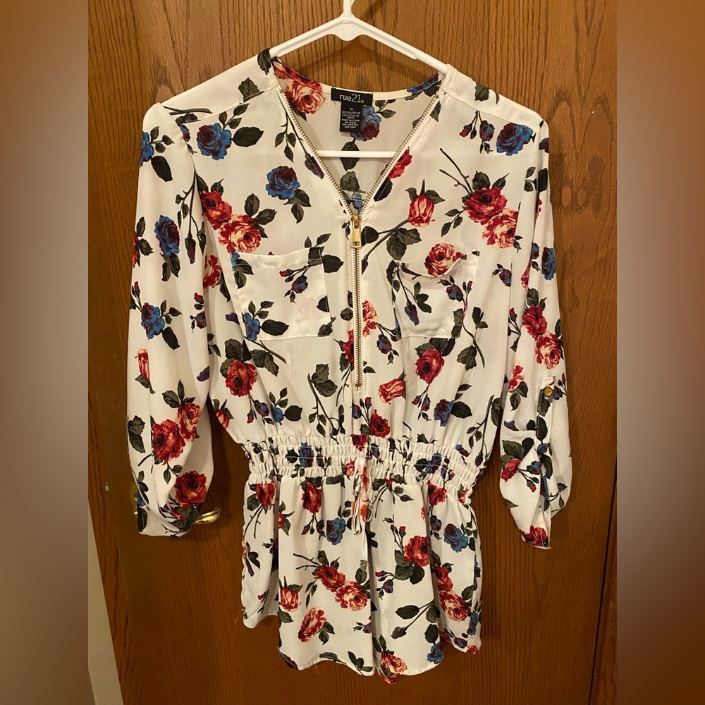 Rue 21, white floral blouse with zipper. Size medium.